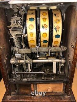 1929 Mills Poinsettia 5 Cent Antique Slot Machine Needs Work