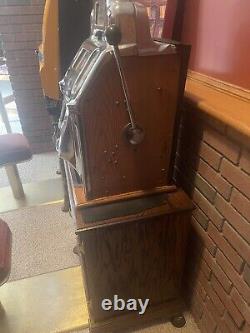 Antique 10 Cents jennings Indian Chief Slot Machine With Beautiful Oak Stand