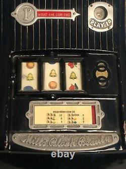 Antique Mills Black Beauty slot machine face