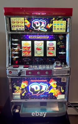 DJ Electrocoin Japanese Token Slot Machine with Tokens