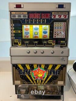Vintage Slot Machine Kohshin Date Line with 450 Tokens and key